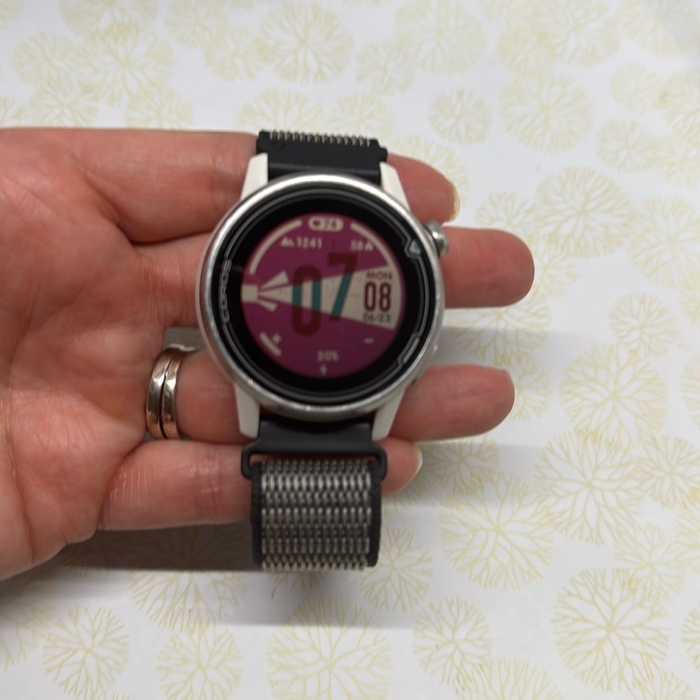 Coros Apex 42mm Watch with Nylon Strap And Charging Cord.